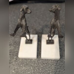 Elegant Bronze Dog Bookends on White Marble
